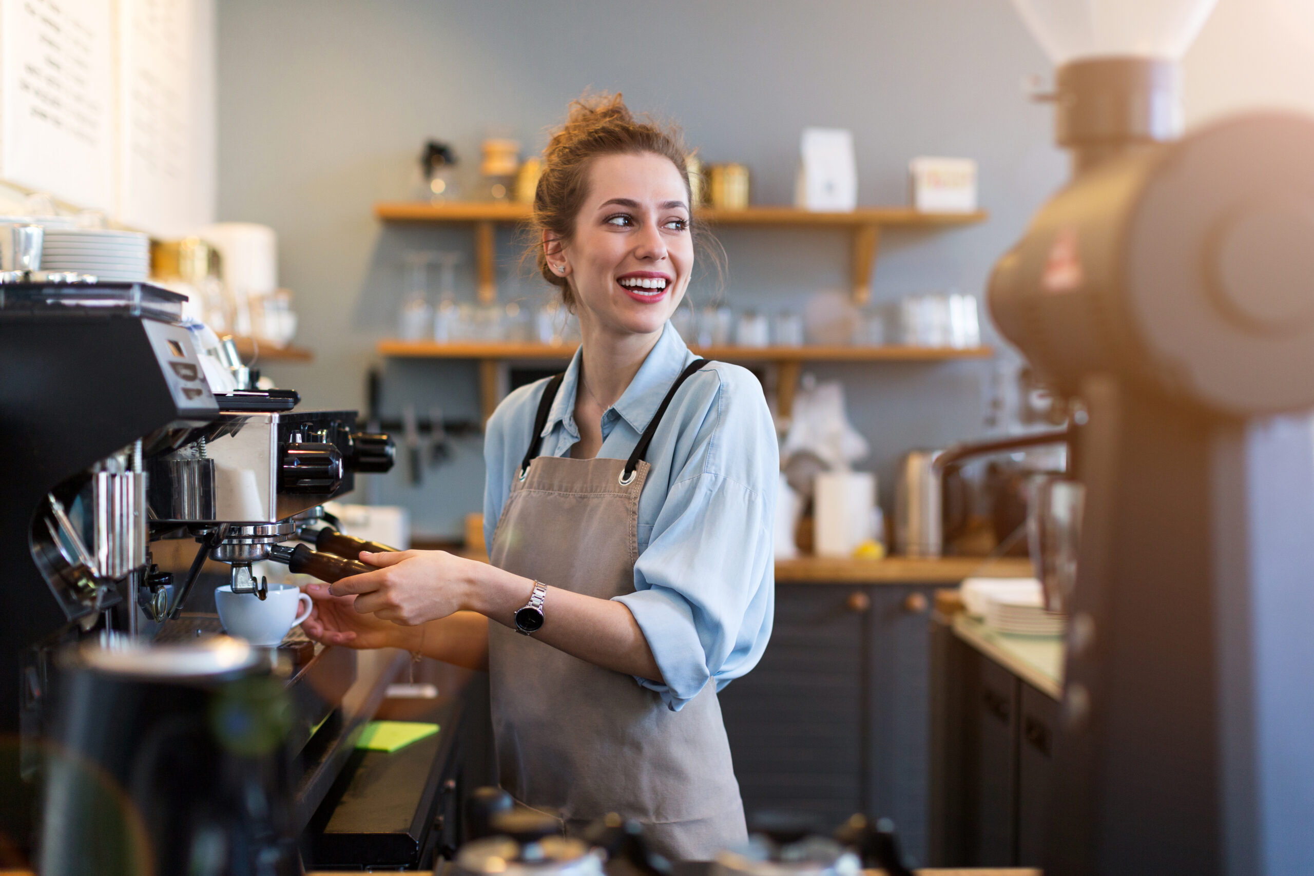 Woman working in coffee shop